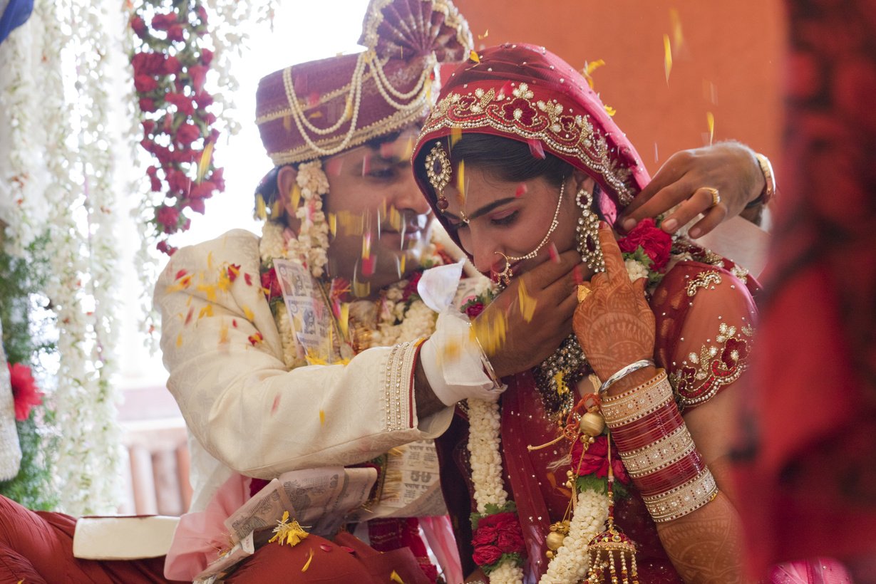 Happy Indian couple at their wedding.